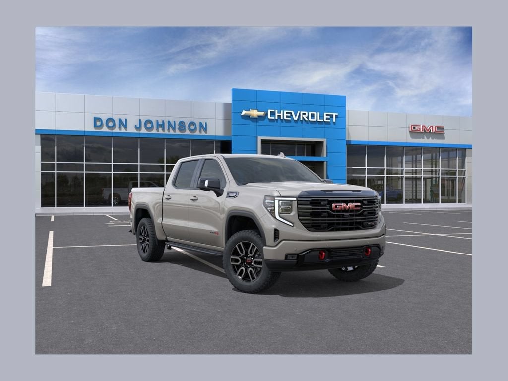 2026 GMC Sierra 1500 AT4 in Coastal Dune — front three-quarter view