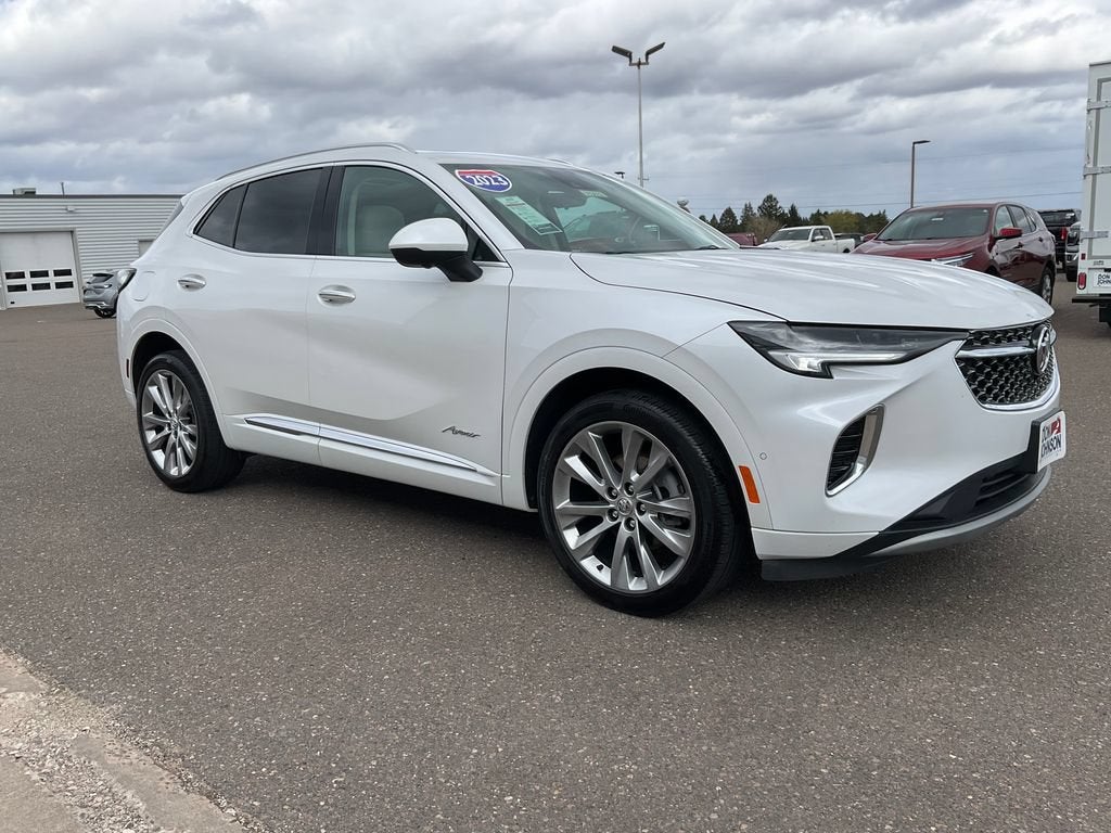 2023 Buick Envision Avenir in White Frost Tricoat — front three-quarter view
